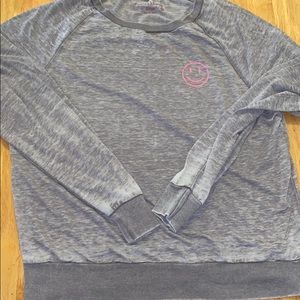 A gray long sleeve tee shirt